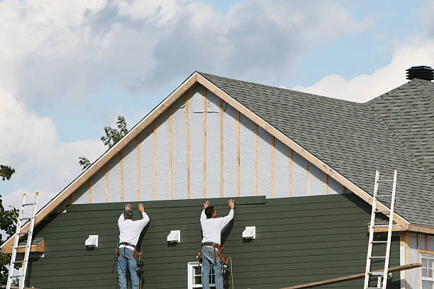 Professional Emergency Siding Repair technician working in Woburn, MA
